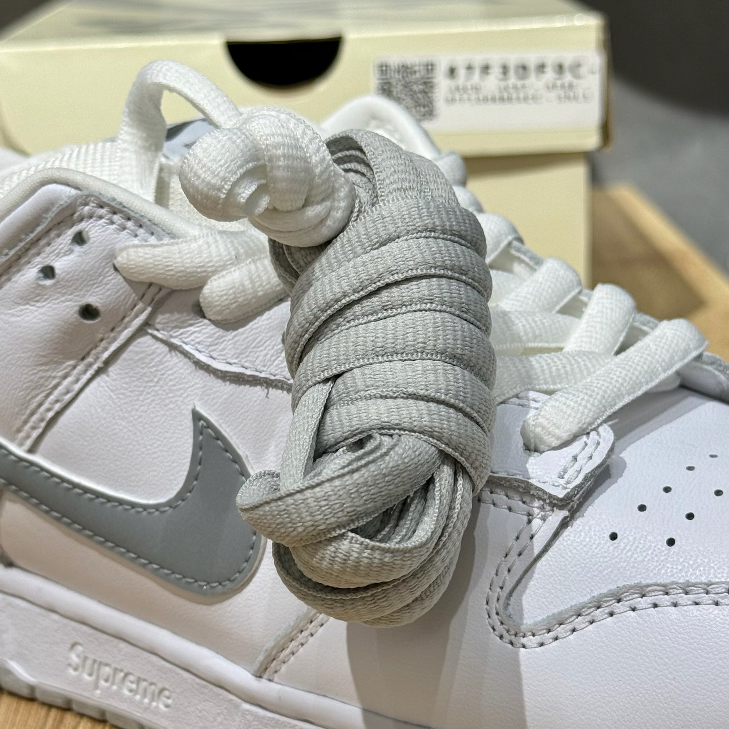 Nike SB Dunk Low x Supreme 94 - White Metallic Silver