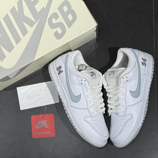 Nike SB Dunk Low x Supreme 94 - White Metallic Silver